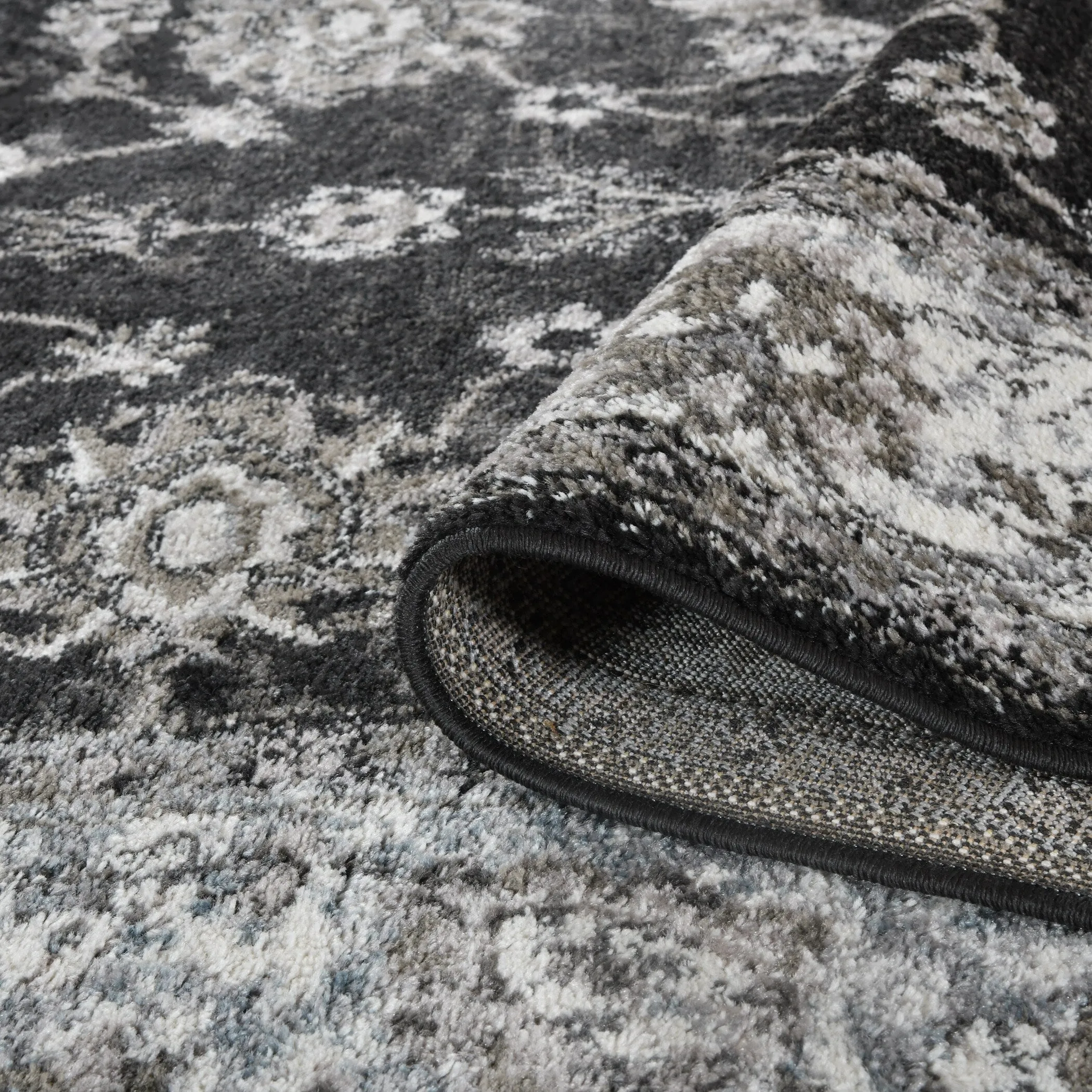 Aurelia Jiru Black Bordered Area Rug
