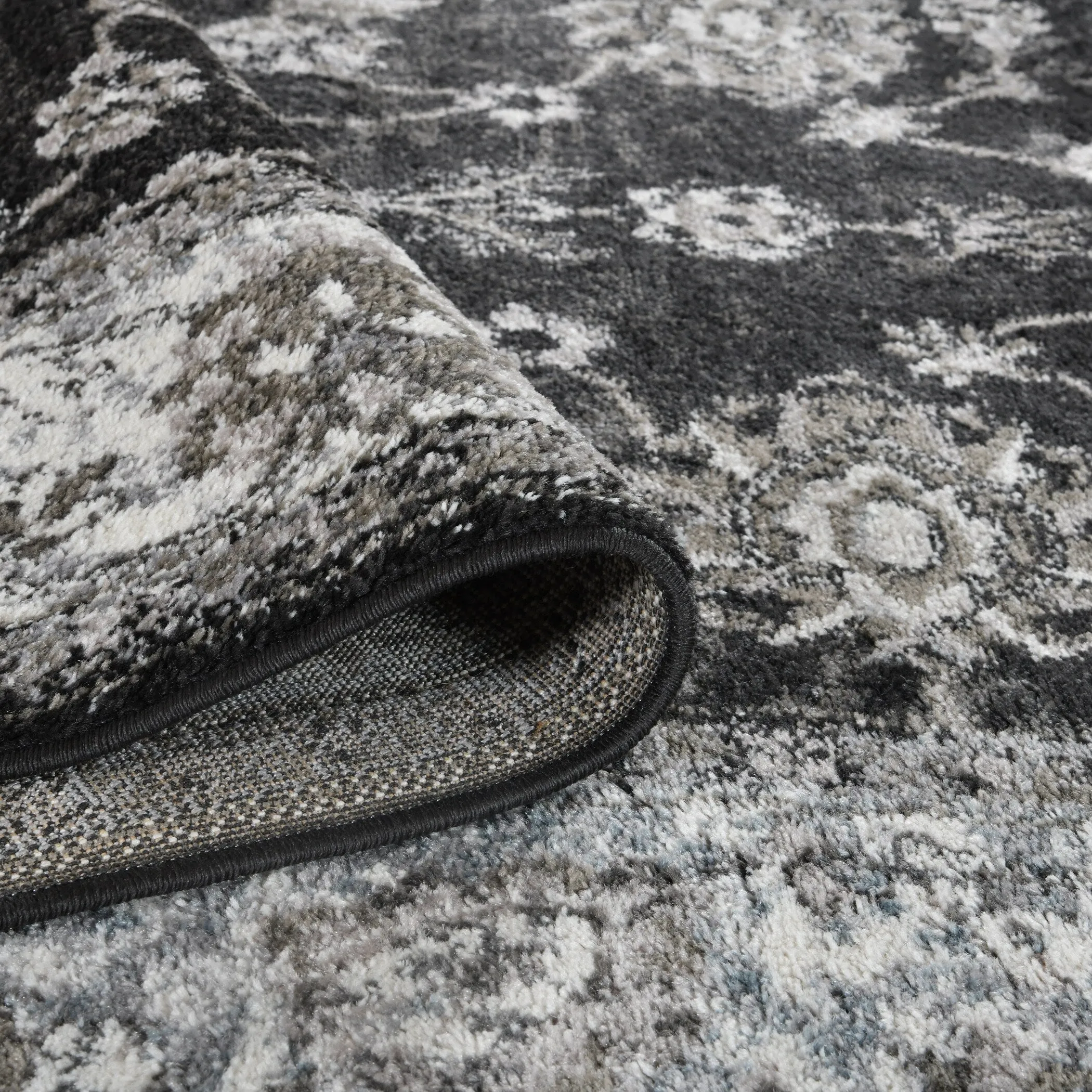 Aurelia Jiru Black Bordered Area Rug