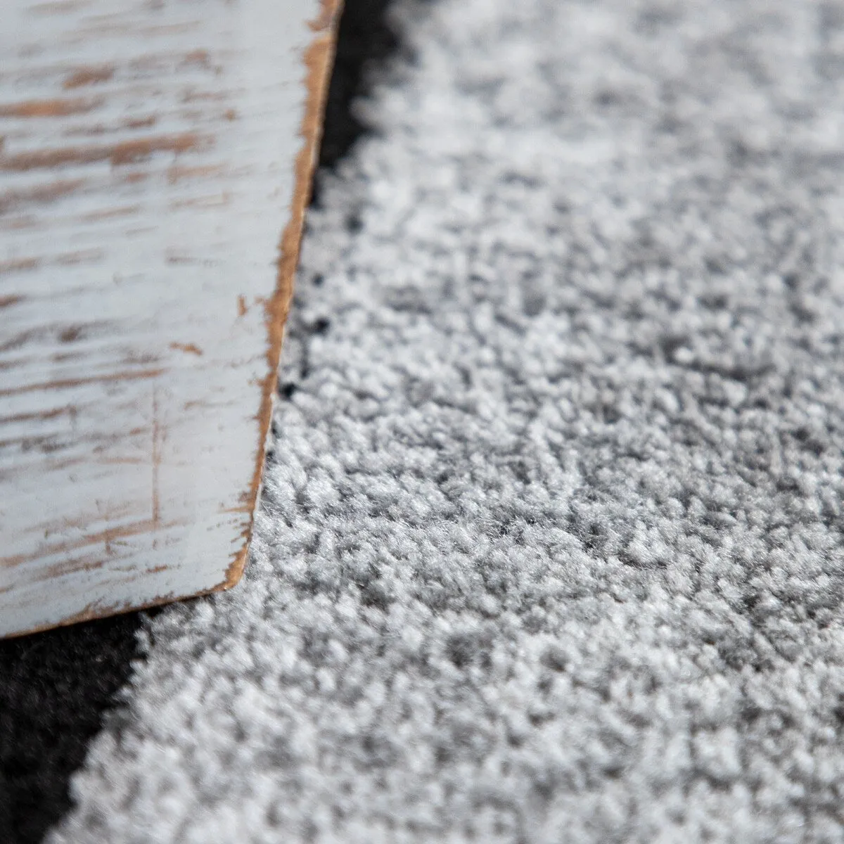 Black White Area Rug with Geometric Pattern and Modern Paint Effect