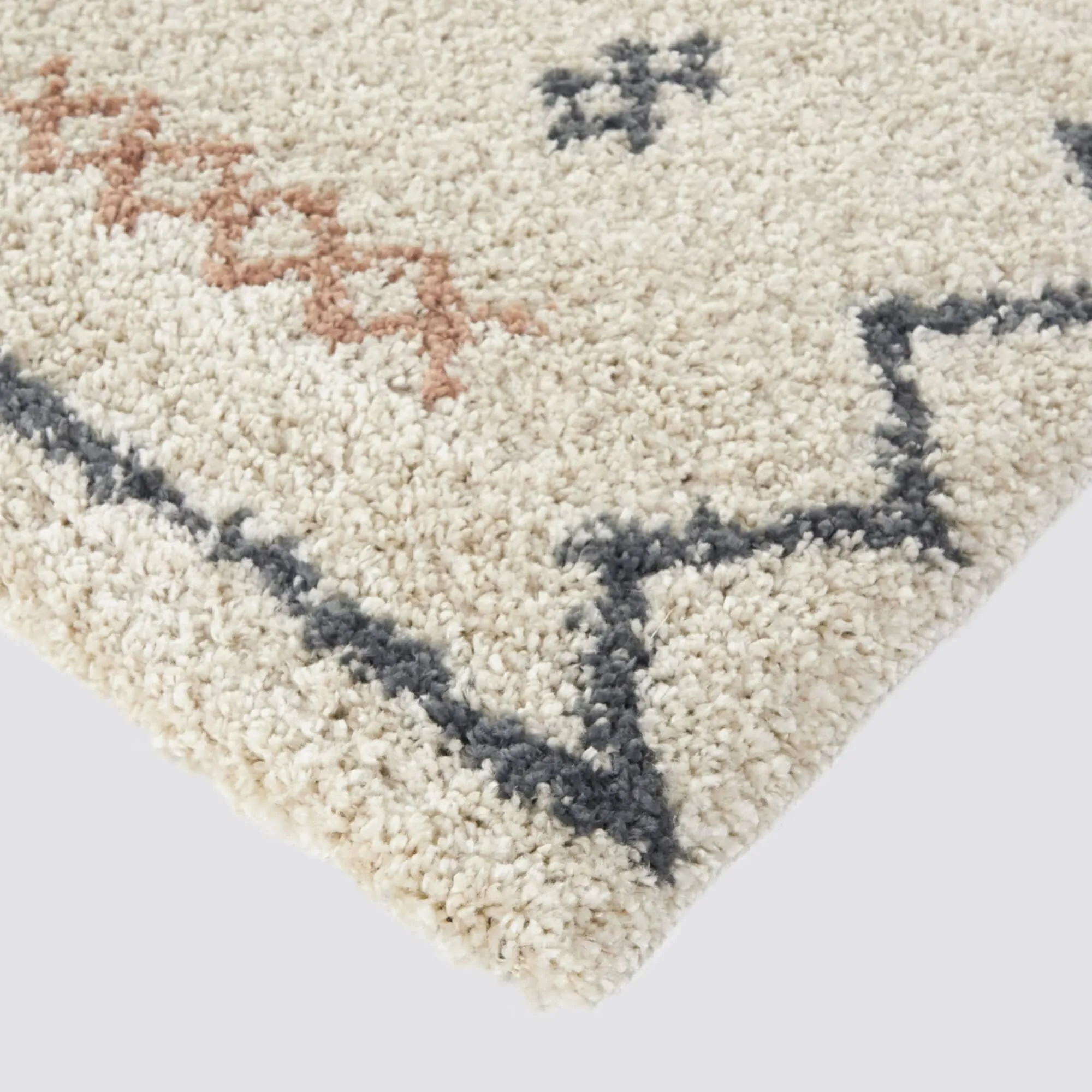 Eila Geometric Southwestern Shag Area Rug