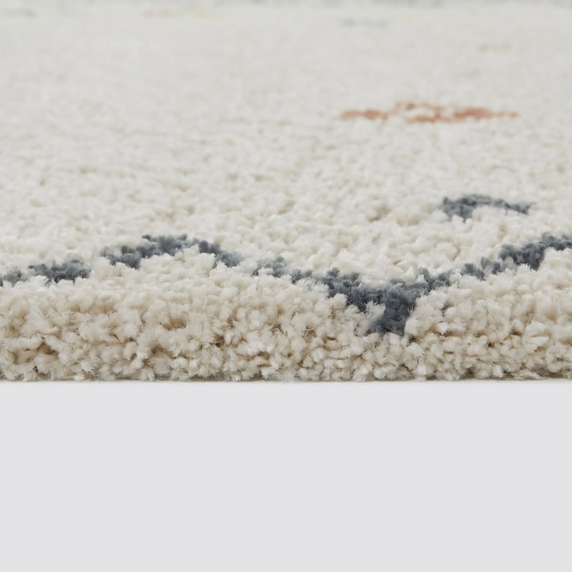 Eila Geometric Southwestern Shag Area Rug