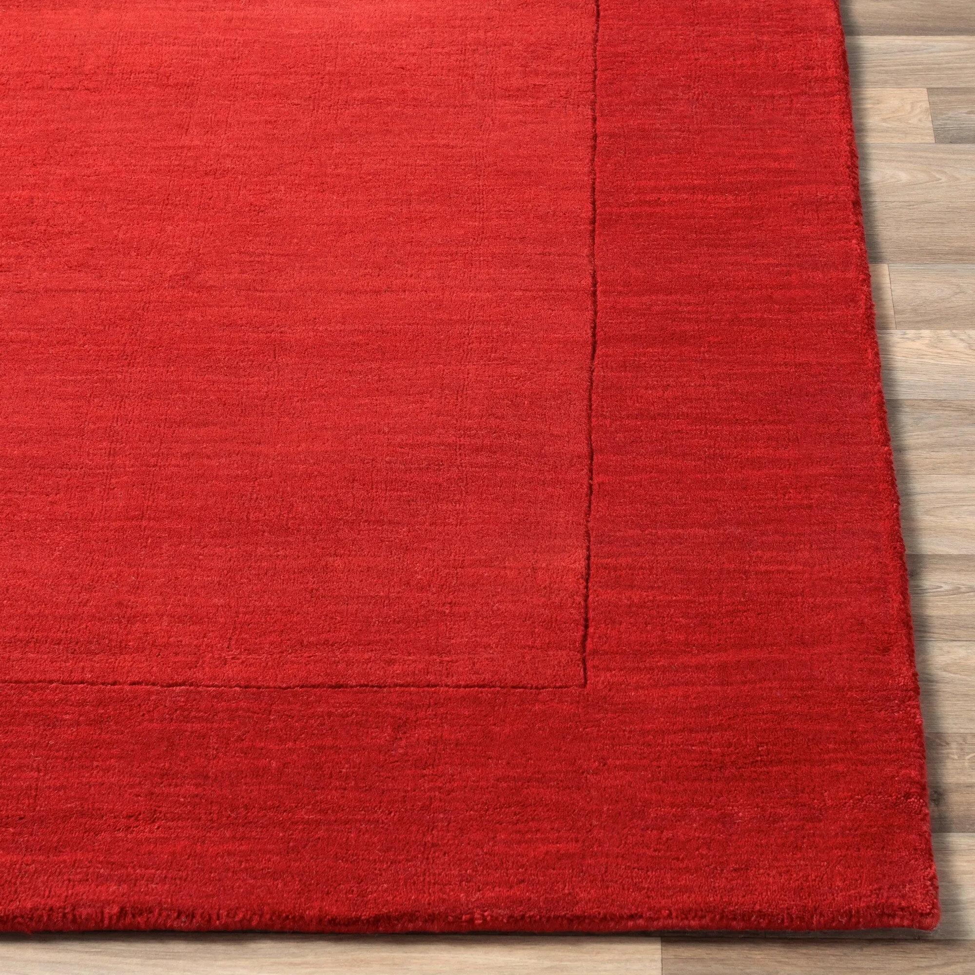 Hand Loomed Odessa Solid Bordered Tone-On-Tone Wool Area Rug