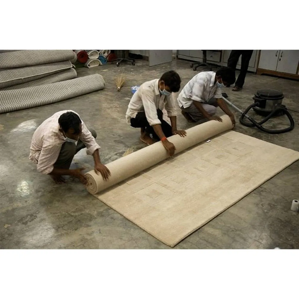 Handmade Piano Brown Wool Rug (India) - 5'6 x 7'10