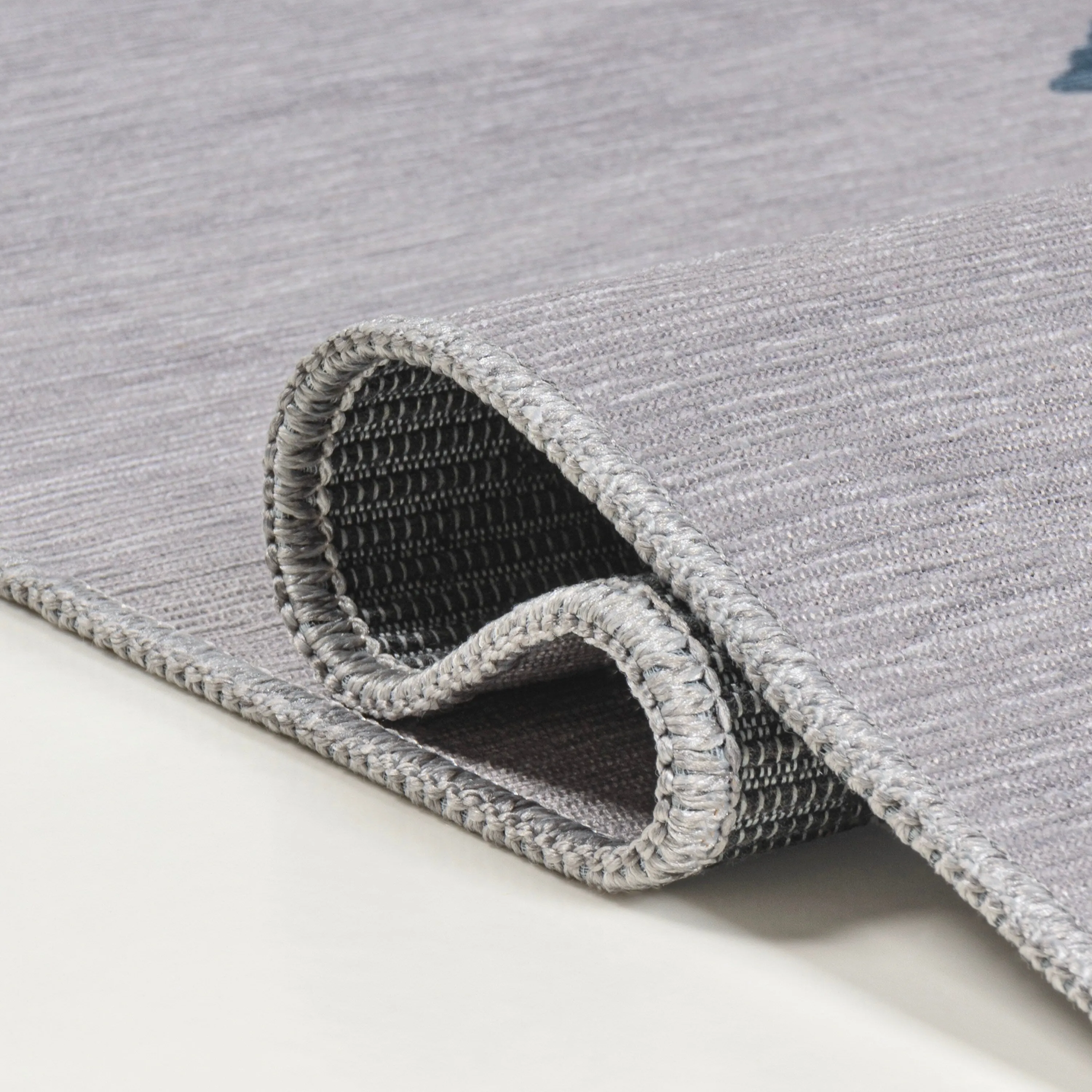 JONATHAN Y Adriel Solid Low-Pile Machine Washable Area Rug