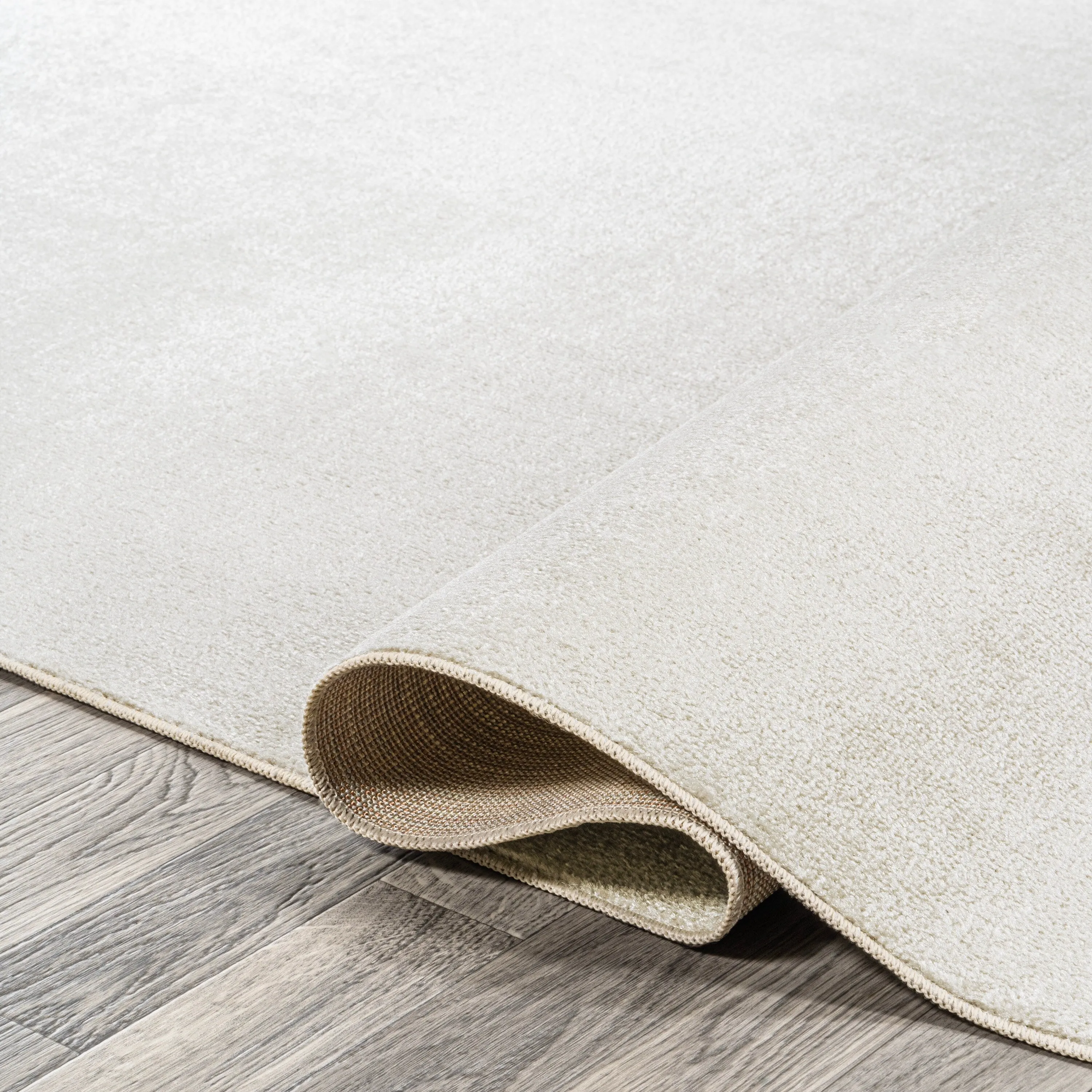 JONATHAN Y Fawning Classic Solid Low-Pile Machine-Washable Terra Area Rug