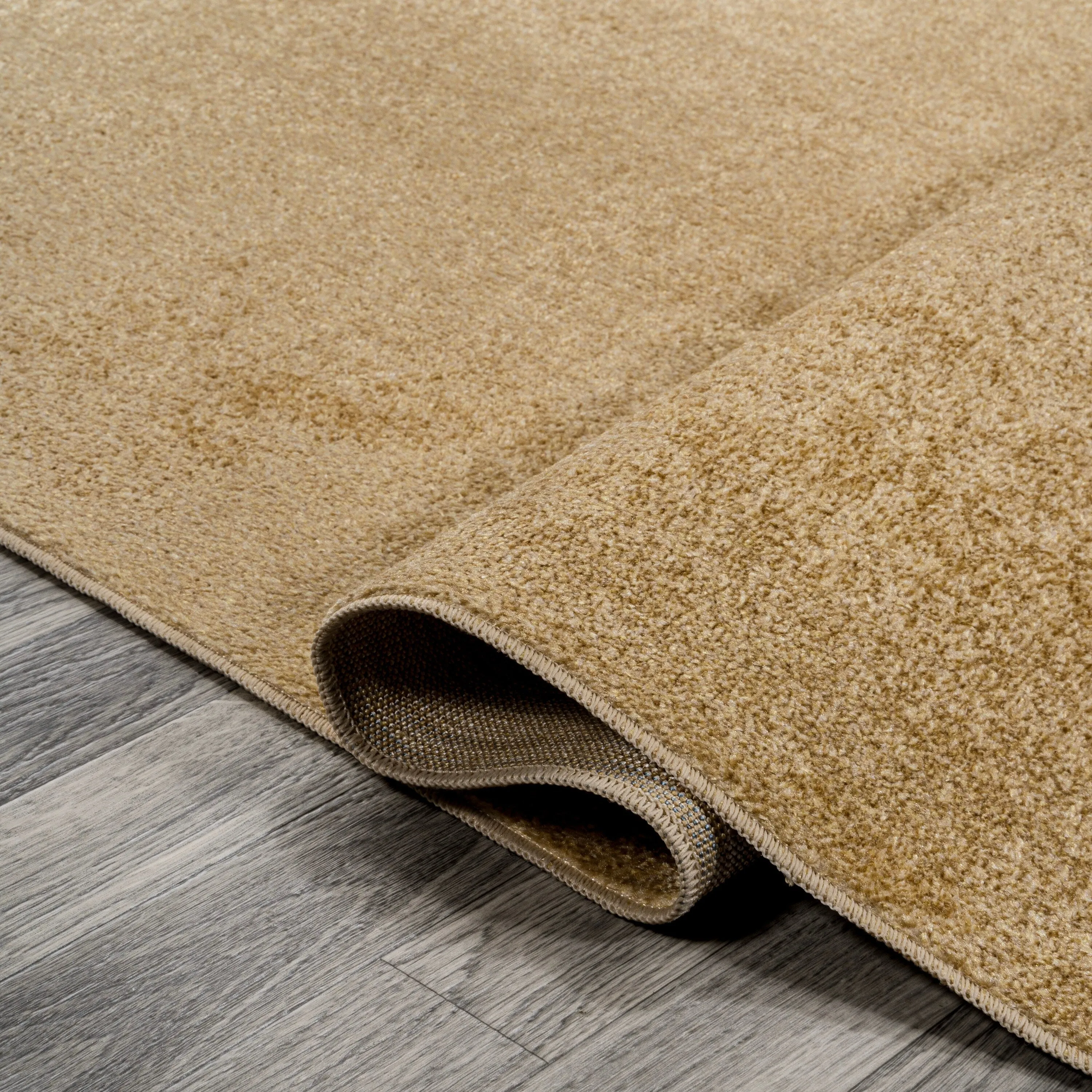 JONATHAN Y Fawning Classic Solid Low-Pile Machine-Washable Terra Area Rug