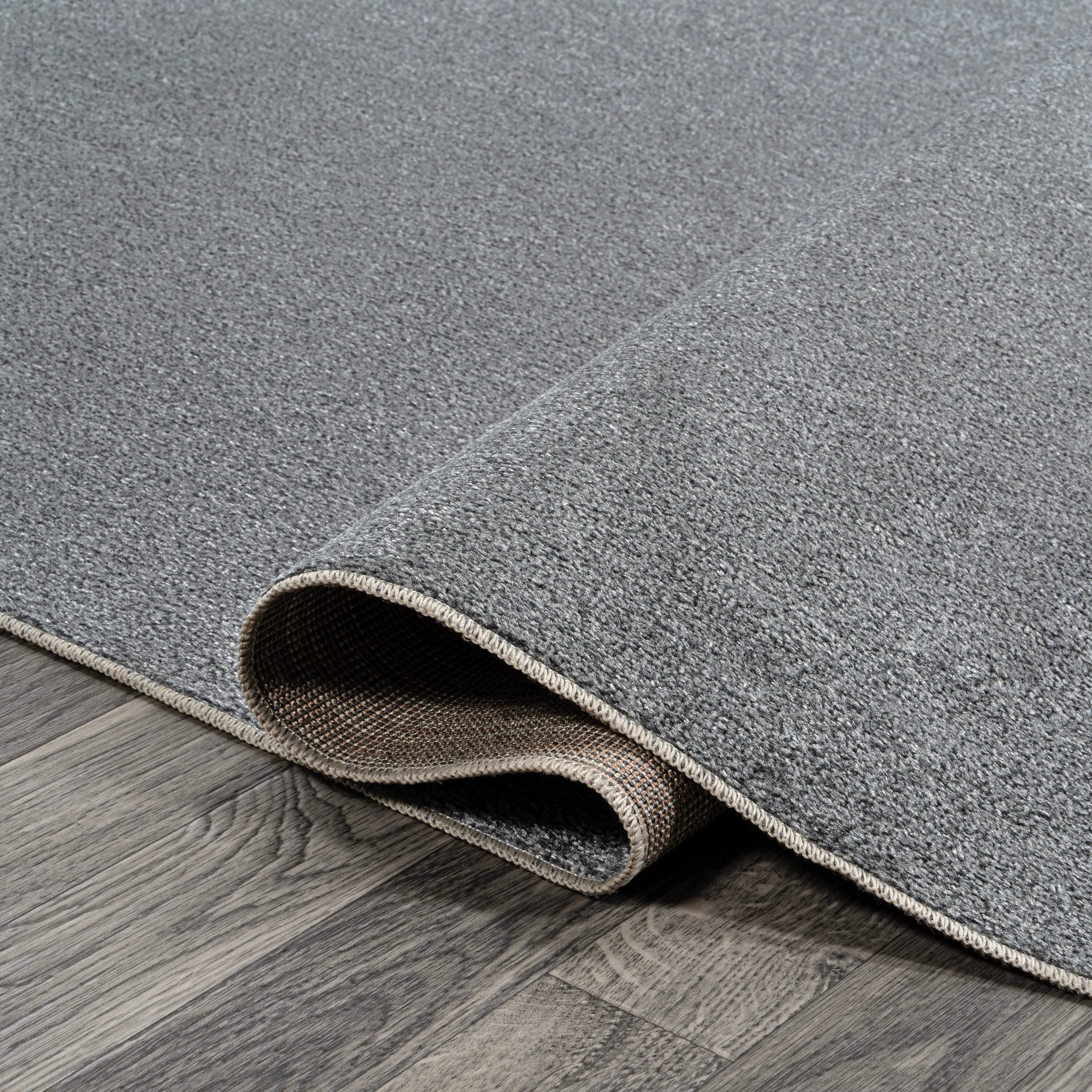 JONATHAN Y Fawning Classic Solid Low-Pile Machine-Washable Terra Area Rug