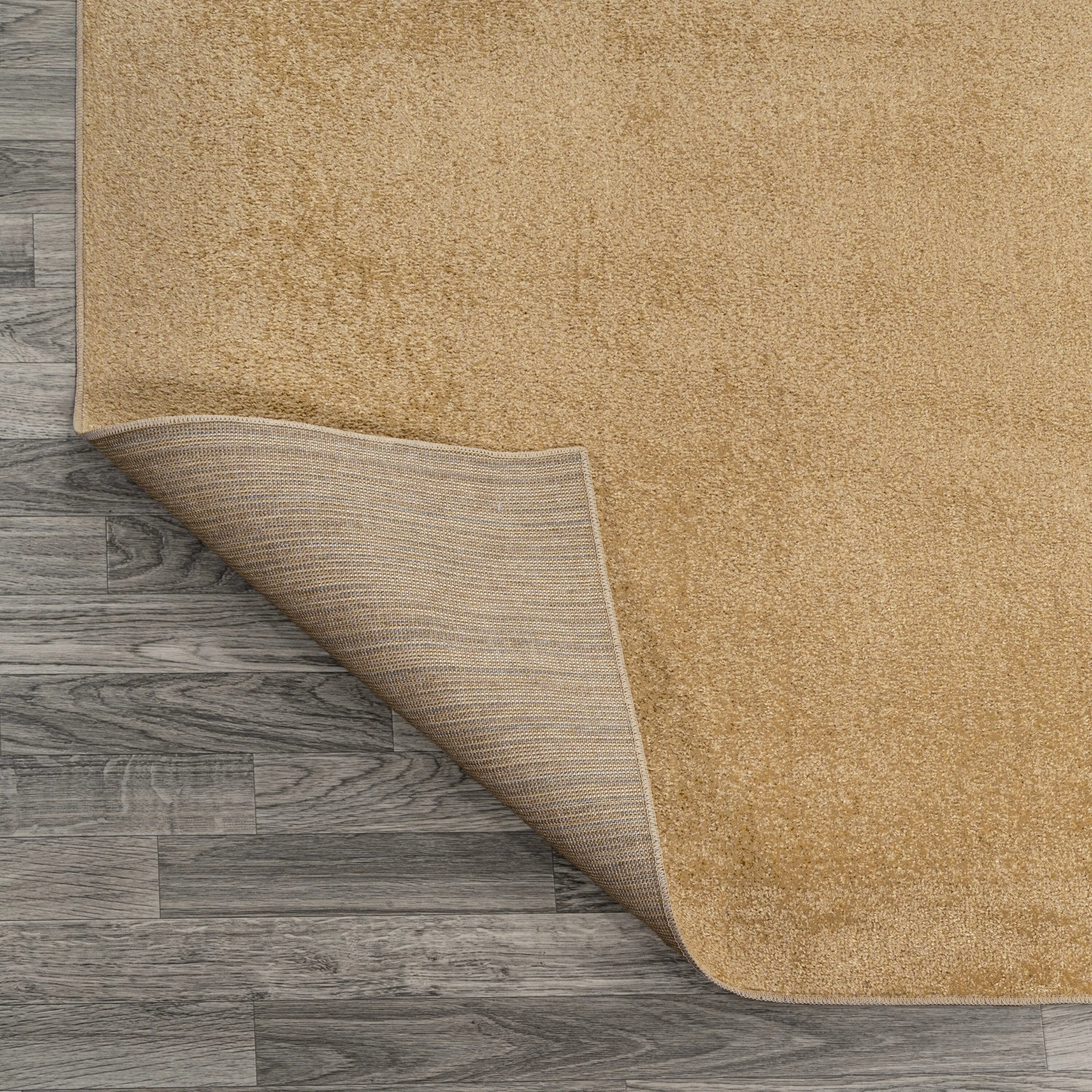 JONATHAN Y Fawning Classic Solid Low-Pile Machine-Washable Terra Area Rug