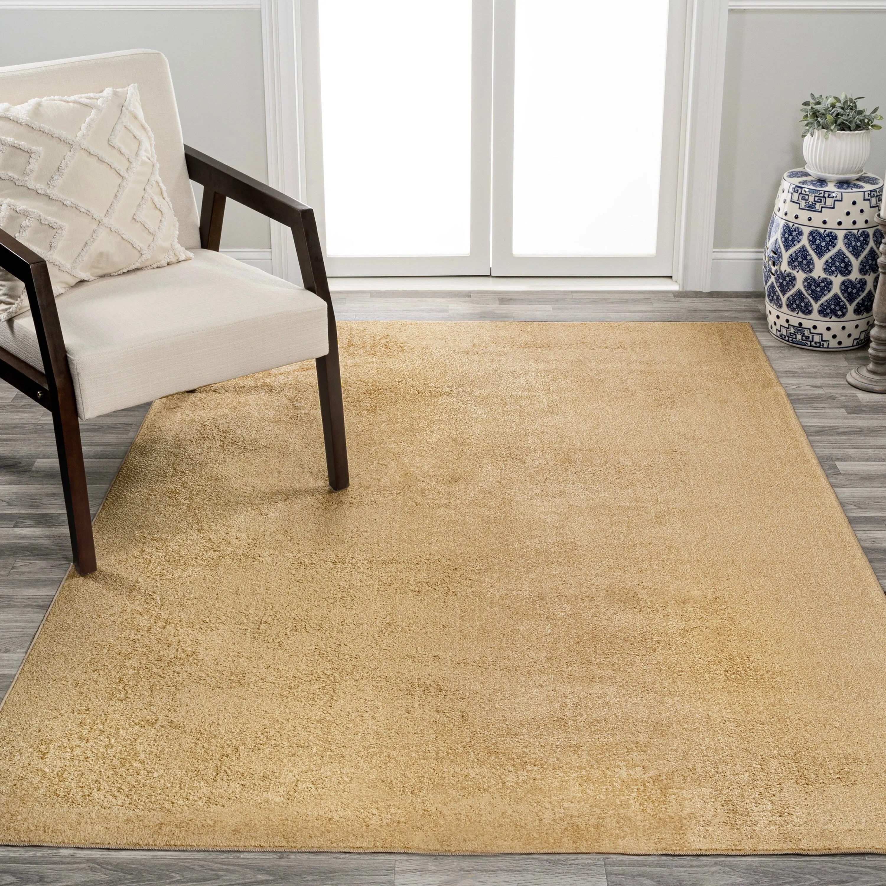 JONATHAN Y Fawning Classic Solid Low-Pile Machine-Washable Terra Area Rug