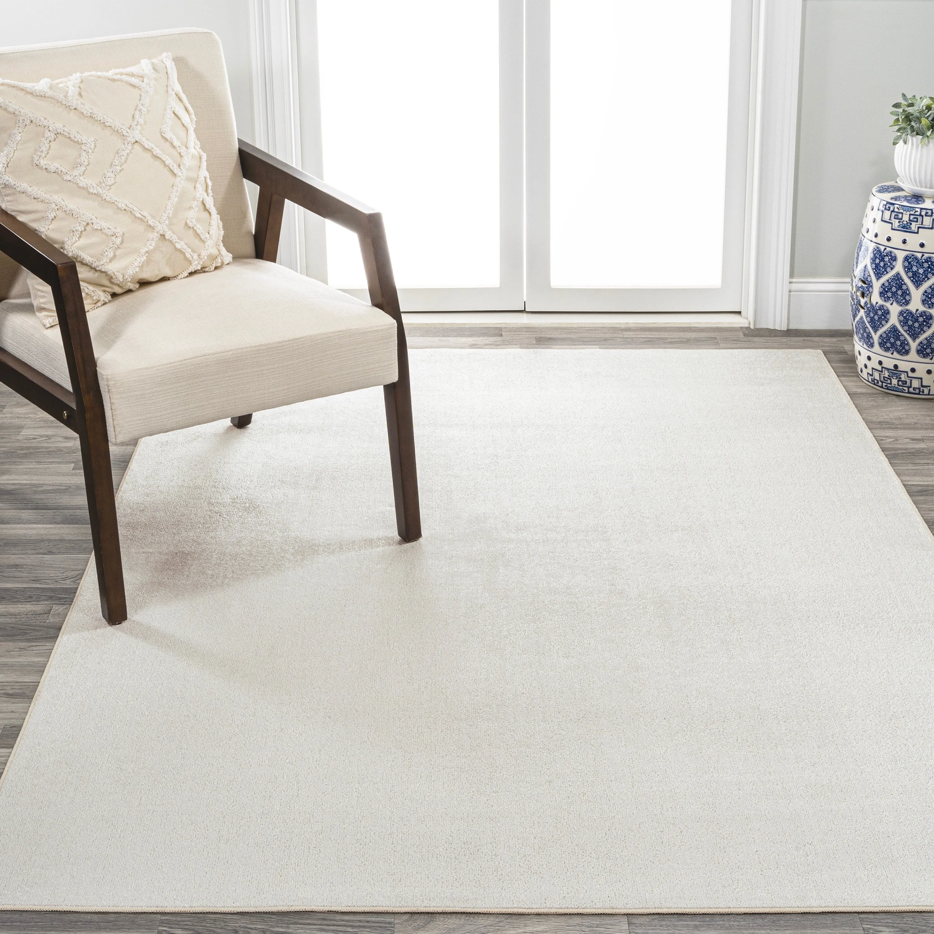 JONATHAN Y Fawning Classic Solid Low-Pile Machine-Washable Terra Area Rug