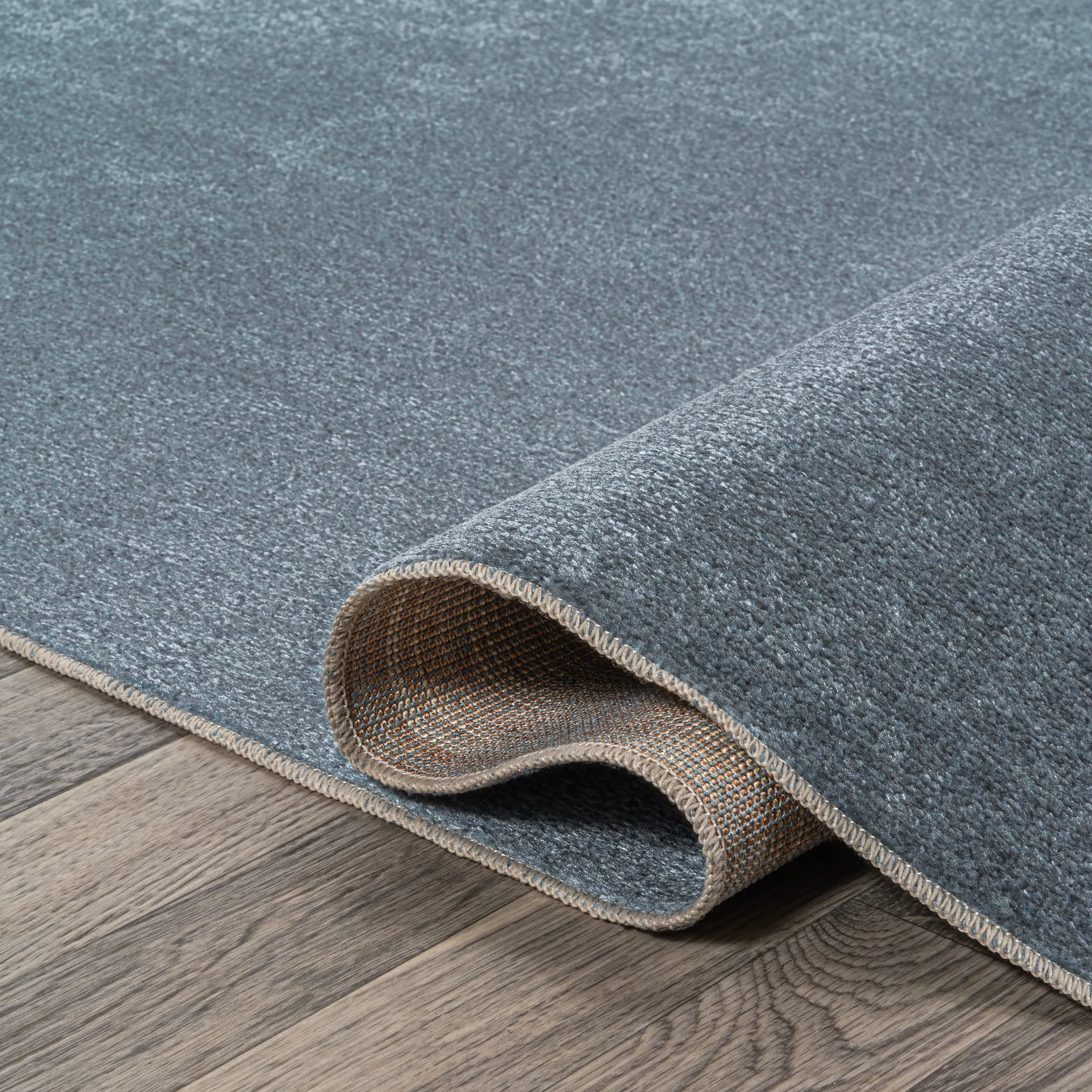 JONATHAN Y Fawning Classic Solid Low-Pile Machine-Washable Terra Area Rug