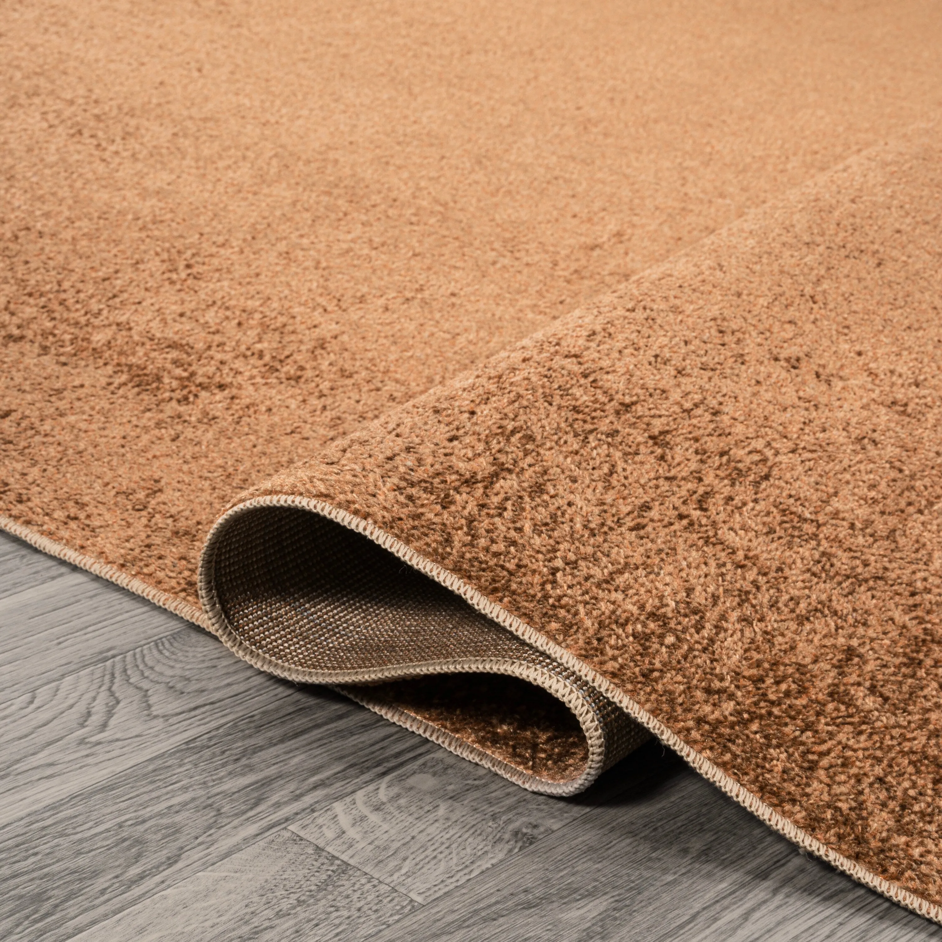 JONATHAN Y Fawning Classic Solid Low-Pile Machine-Washable Terra Area Rug
