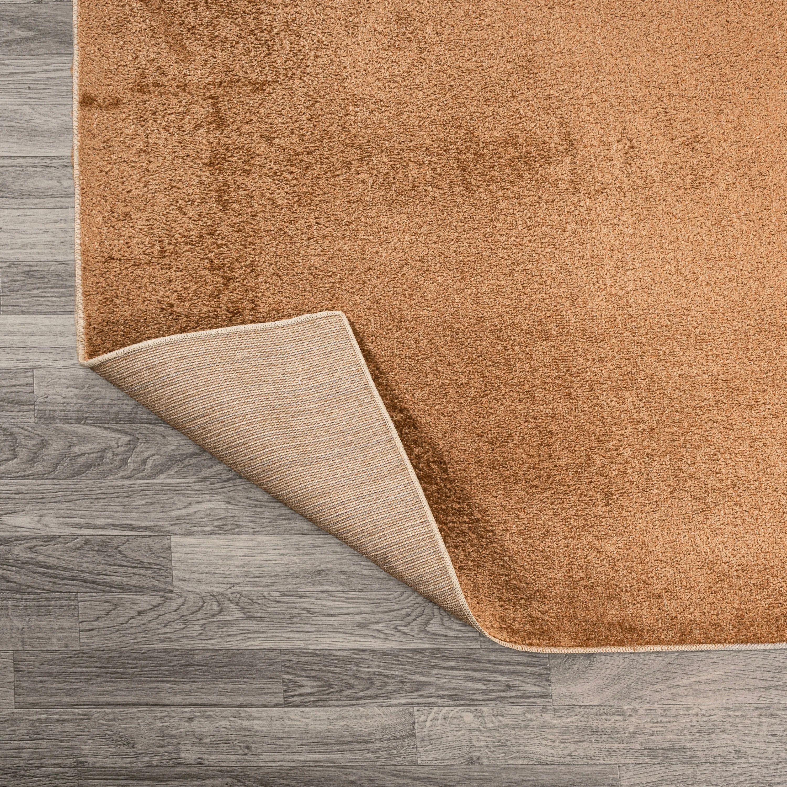JONATHAN Y Fawning Classic Solid Low-Pile Machine-Washable Terra Area Rug