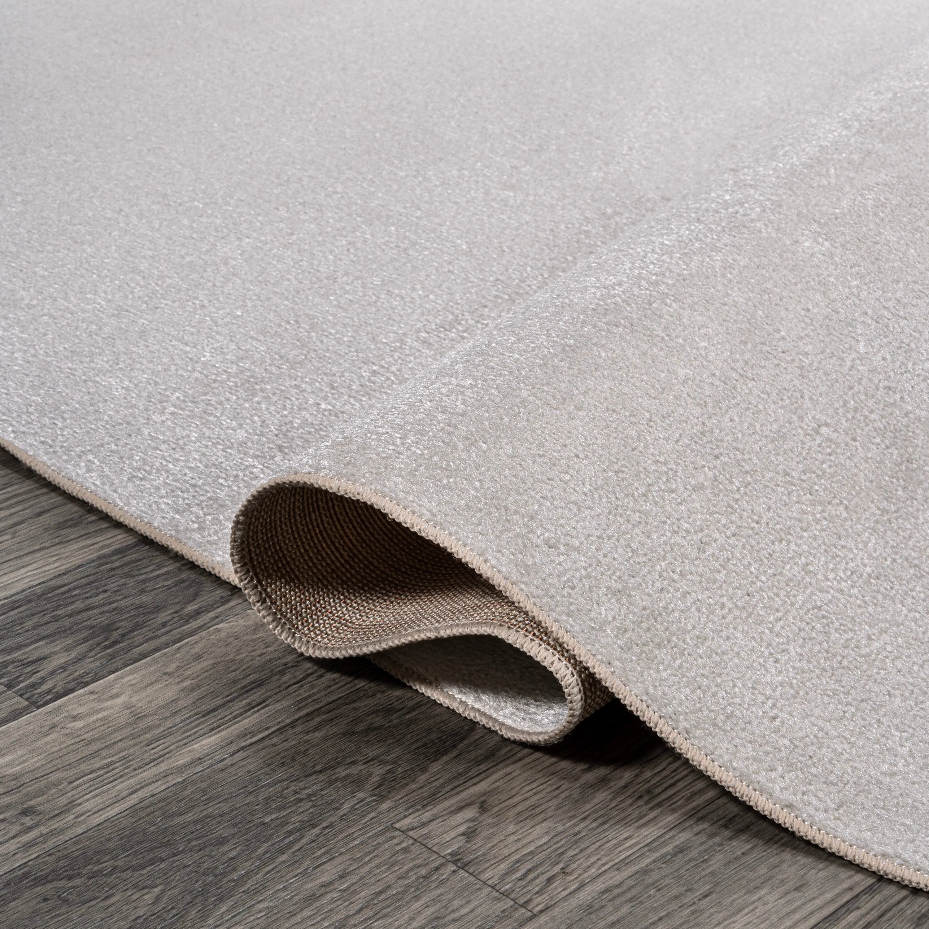 JONATHAN Y Fawning Classic Solid Low-Pile Machine-Washable Terra Area Rug