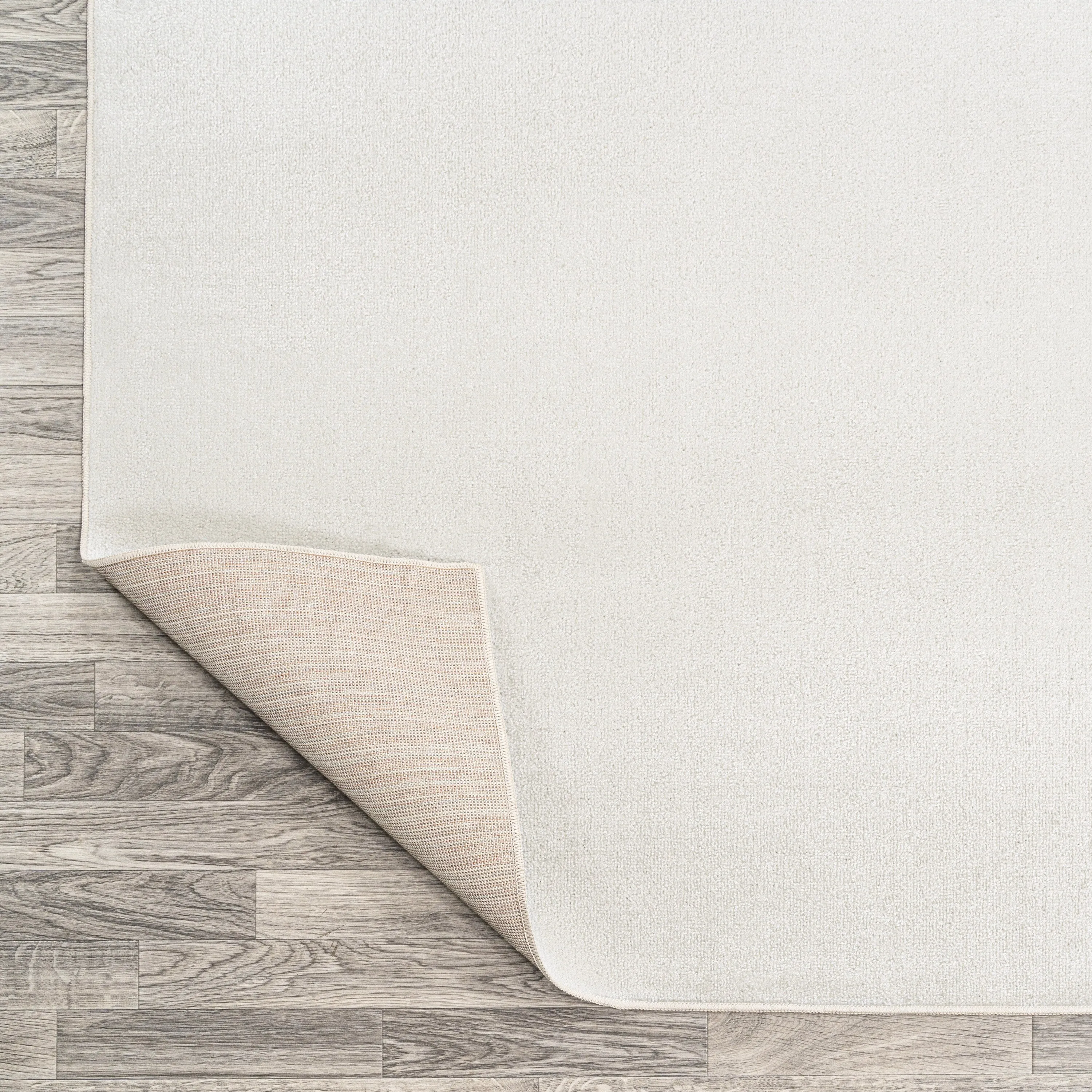 JONATHAN Y Fawning Classic Solid Low-Pile Machine-Washable Terra Area Rug