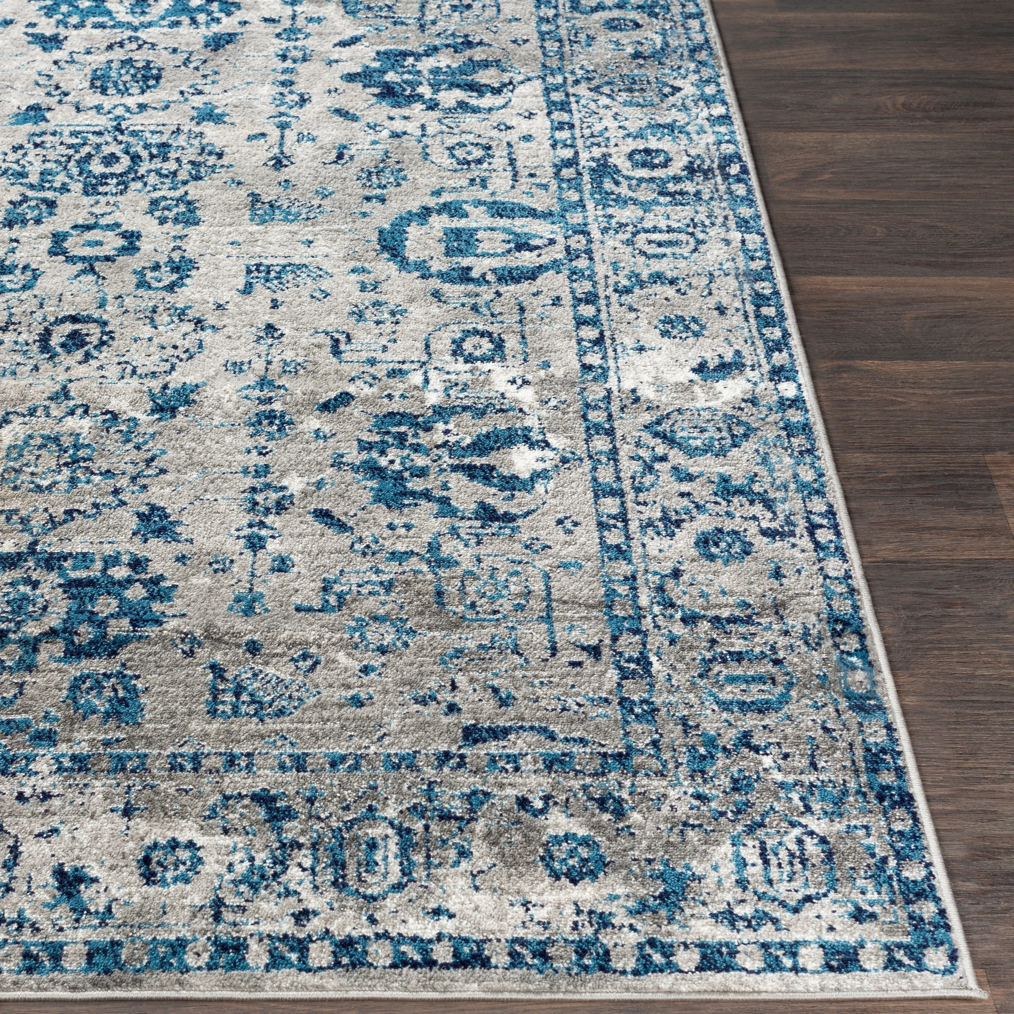Livabliss Reimes Distressed Traditional Area Rug