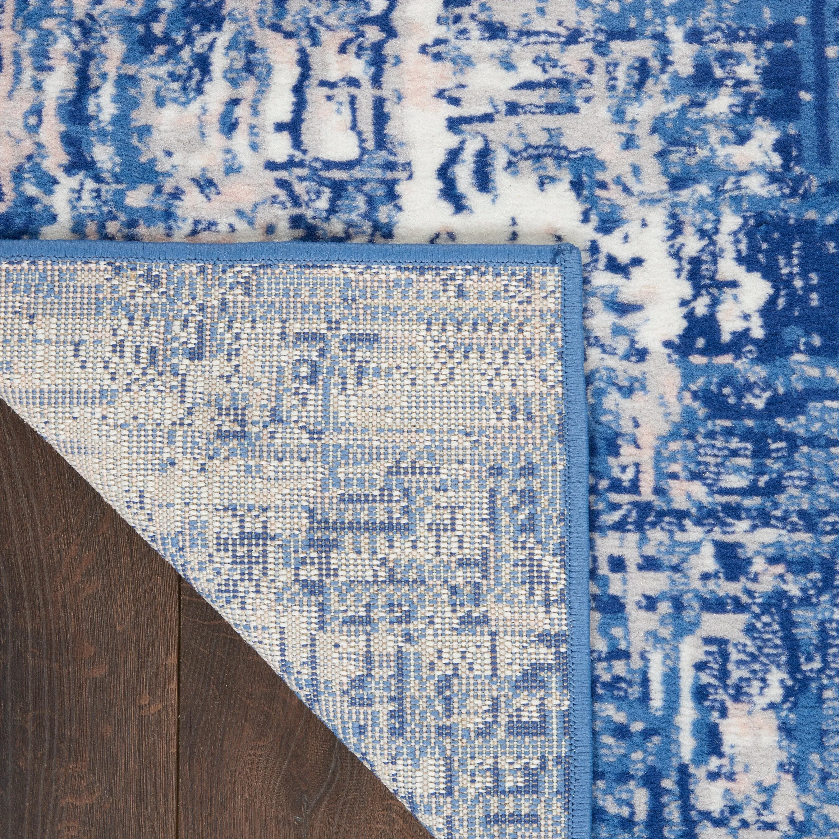 Nourison Whimsicle Modern Distressed Abstract Blue Ivory Area Rug