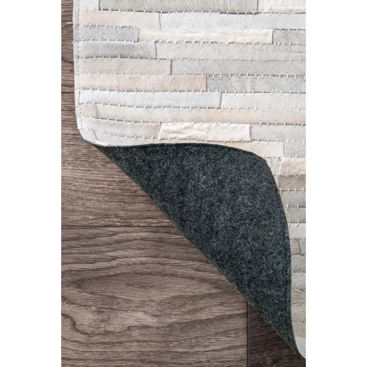 Nuloom Handmade Natural Patchwork Cowhide Leather Rug
