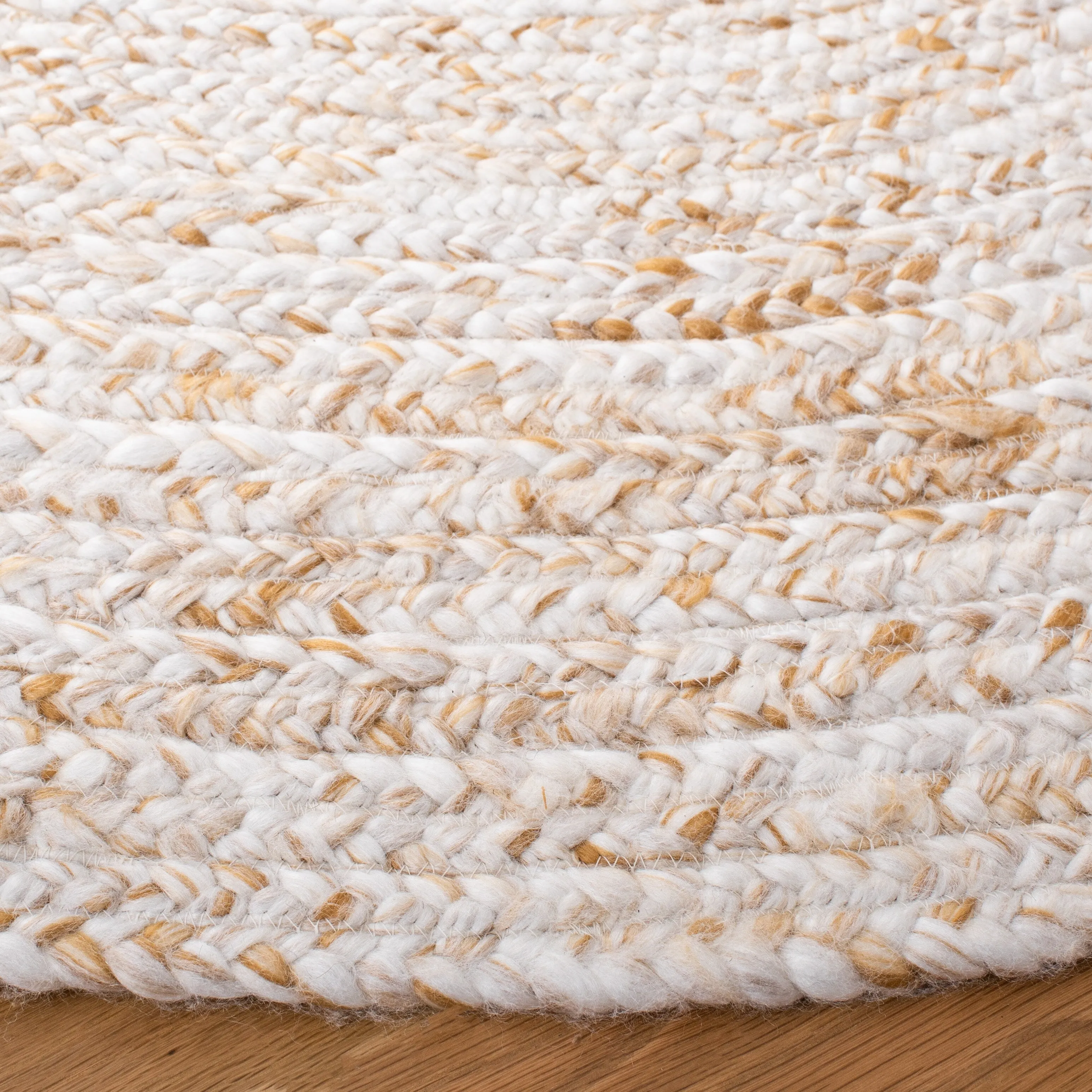 SAFAVIEH Handmade Braided Malene Round Rug