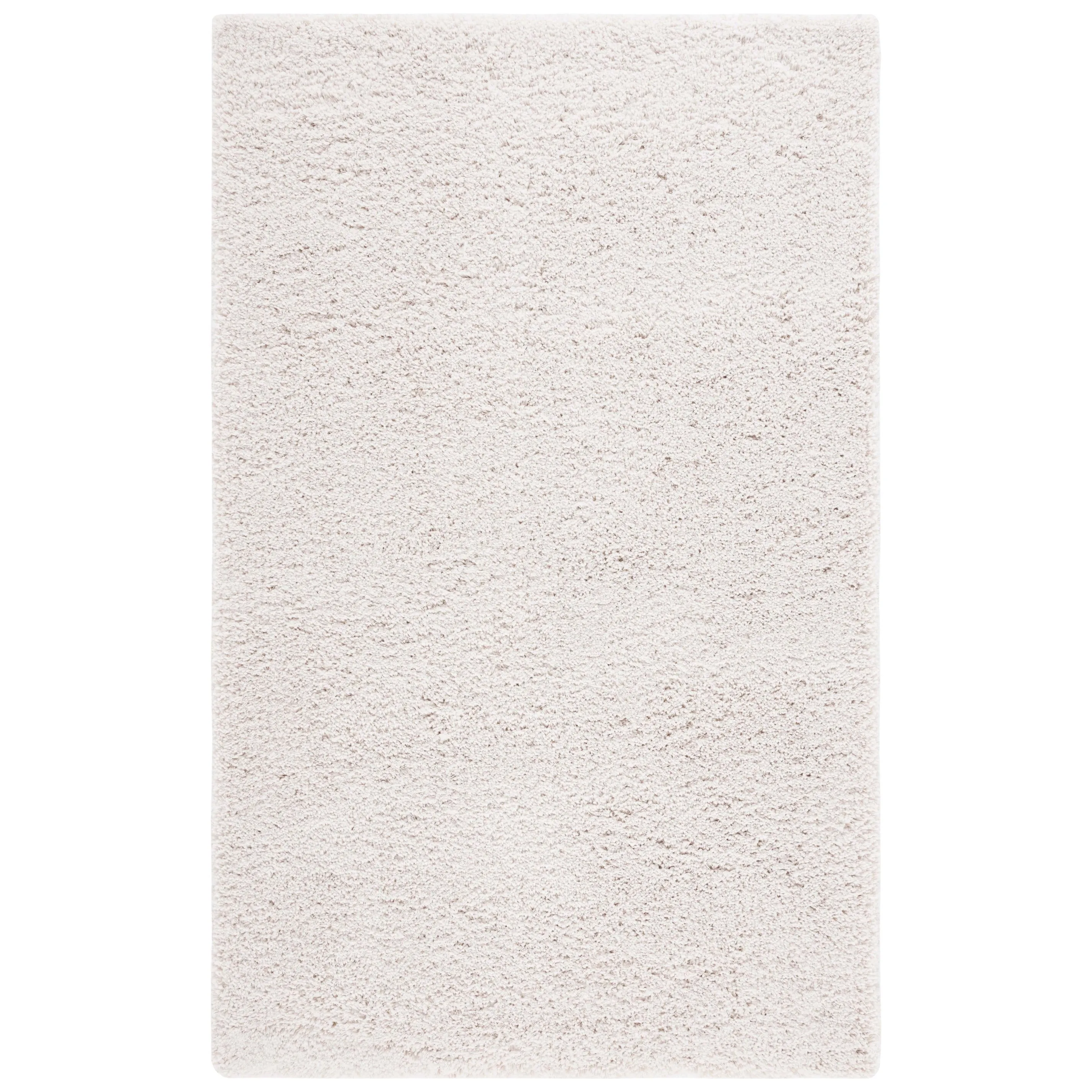SAFAVIEH Handmade Luxe Gianna Gezina Shag Rug