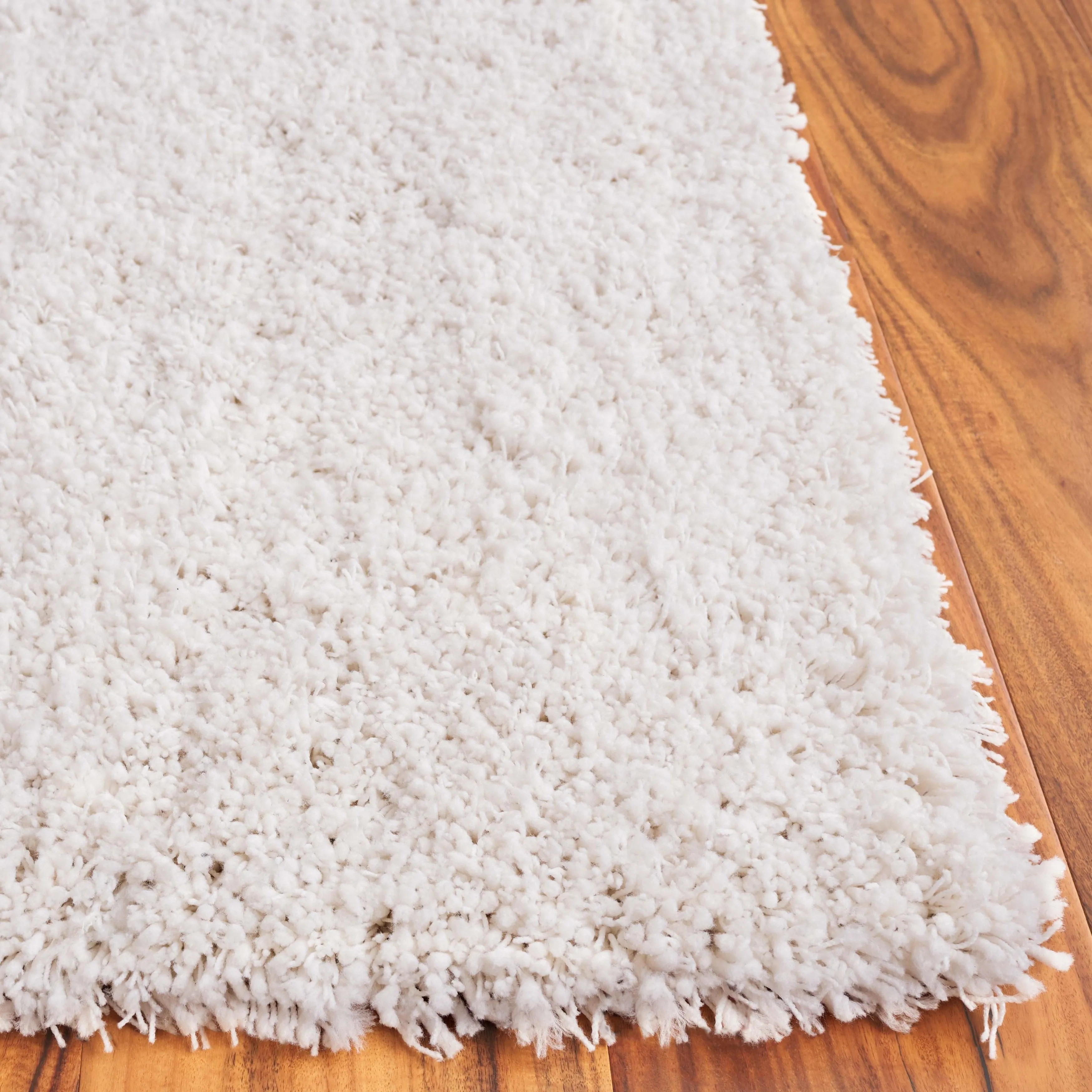 SAFAVIEH Handmade Luxe Gianna Gezina Shag Rug