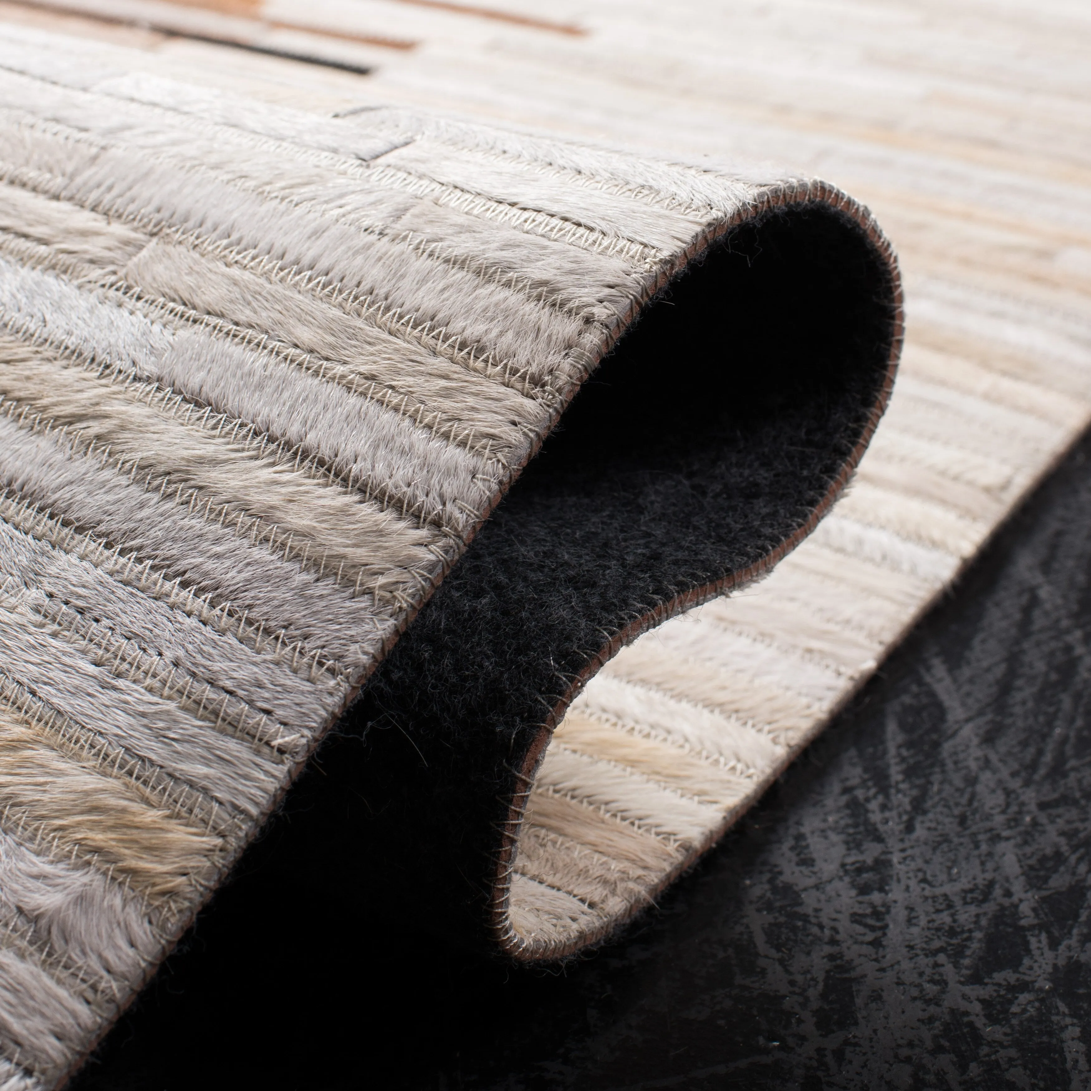 SAFAVIEH Handmade Studio Tobi Natural Hide Leather Rug