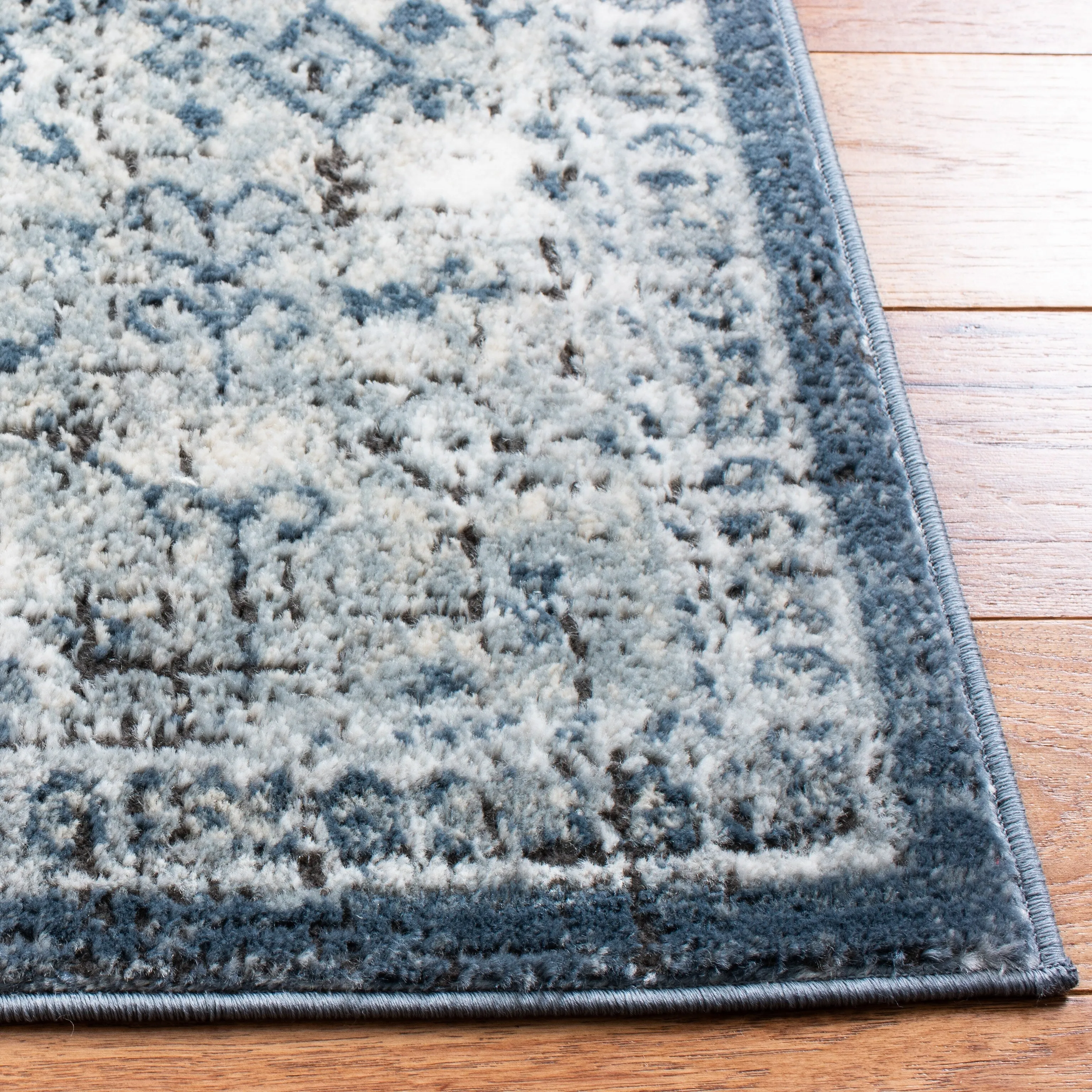 SAFAVIEH Oregon Hildegarde Traditional Oriental Navy/Ivory Rug