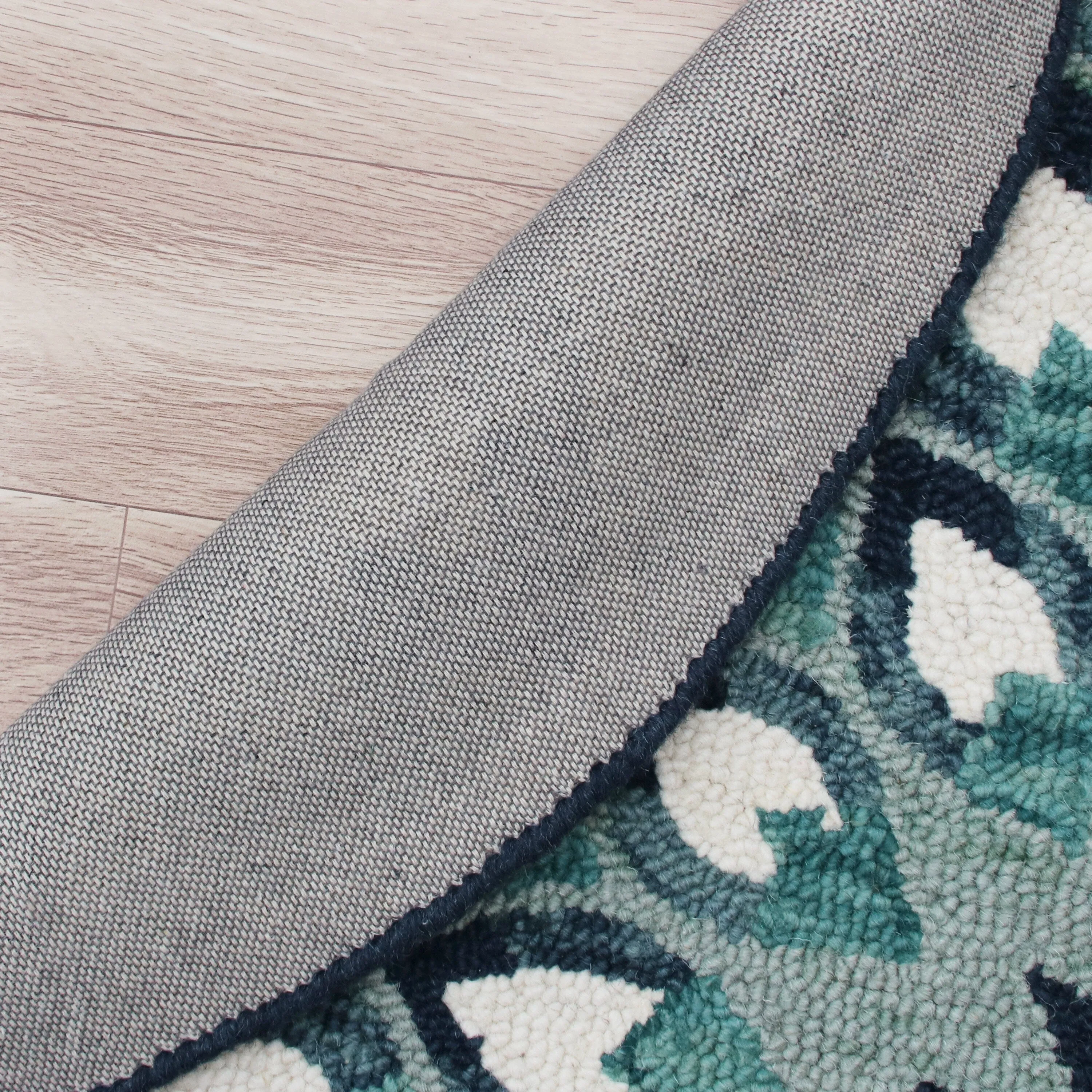 Sevita Hand Tufted Feathering Floral Round Rug
